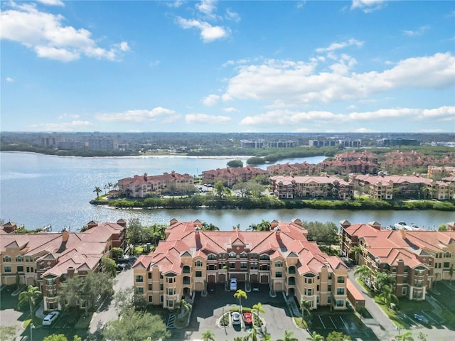 drone / aerial view with a water view