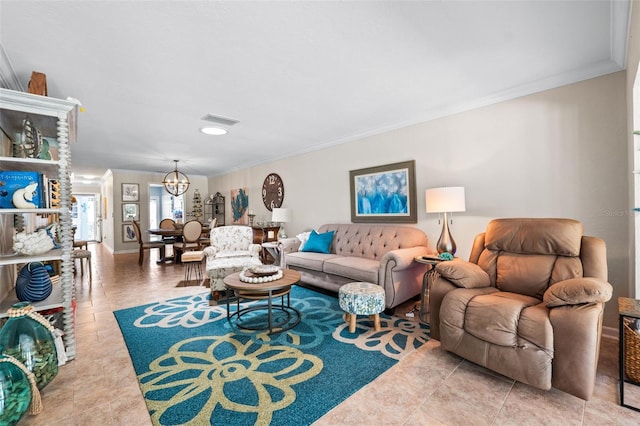 living room with a chandelier, tile patterned flooring, and ornamental molding