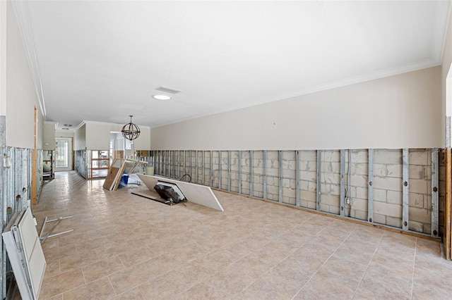 interior space featuring a notable chandelier and crown molding