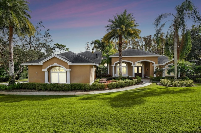 view of front of home featuring a yard