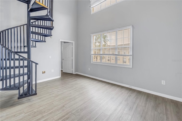 501 Knights Run Ave Unit 2308, Tampa, FL 33602 - foyer entrance featuring light wood-type flooring and a towering ceiling