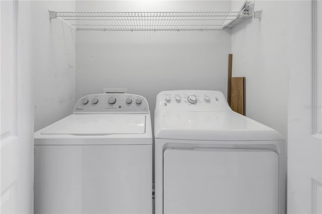 501 Knights Run Ave Unit 2308, Tampa, FL 33602 - washroom featuring washing machine and dryer