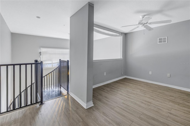 501 Knights Run Ave Unit 2308, Tampa, FL 33602 - spare room featuring ceiling fan and light wood-type flooring