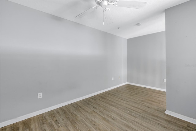 501 Knights Run Ave Unit 2308, Tampa, FL 33602 - spare room with ceiling fan and wood-type flooring