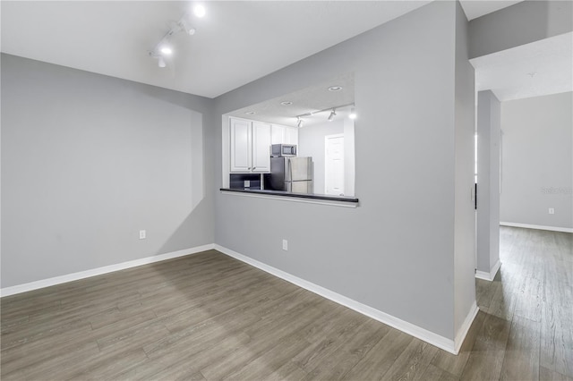 501 Knights Run Ave Unit 2308, Tampa, FL 33602 - interior space featuring light hardwood / wood-style flooring and track lighting