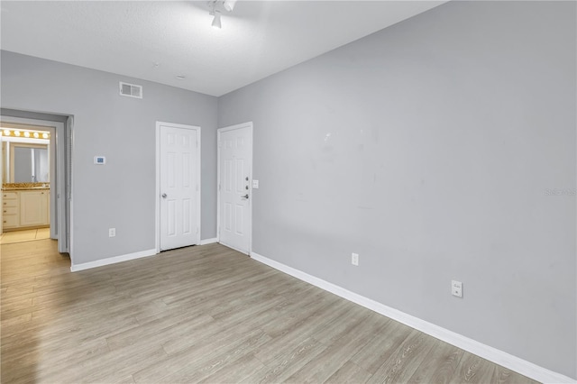501 Knights Run Ave Unit 2308, Tampa, FL 33602 - empty room featuring light hardwood / wood-style flooring