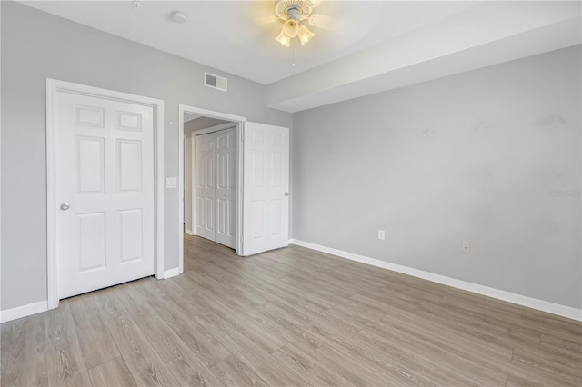 501 Knights Run Ave Unit 2308, Tampa, FL 33602 - unfurnished bedroom with ceiling fan and light hardwood / wood-style floors