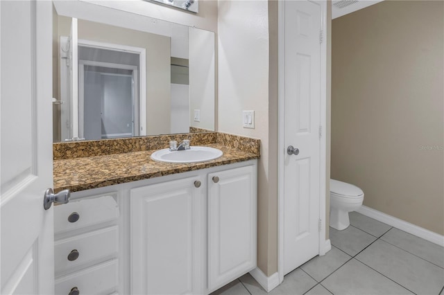 501 Knights Run Ave Unit 2308, Tampa, FL 33602 - bathroom with toilet, vanity, and tile patterned floors