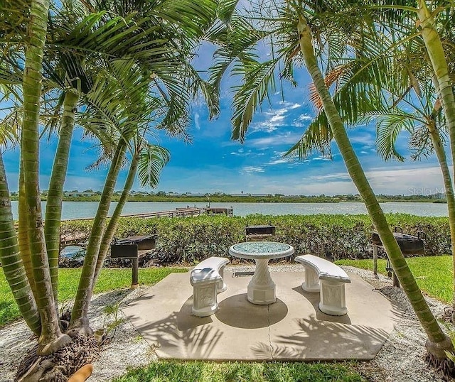 view of patio / terrace with a water view