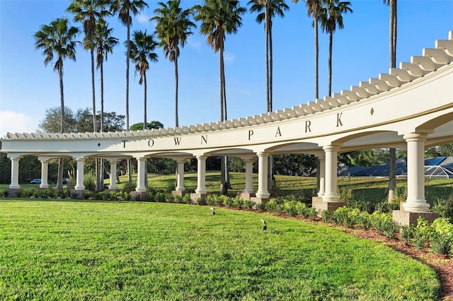 view of community featuring a lawn