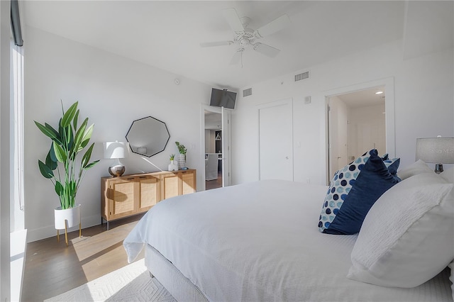 bedroom featuring ceiling fan and hardwood / wood-style flooring