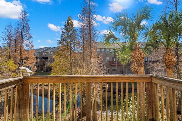 wooden terrace with a water view