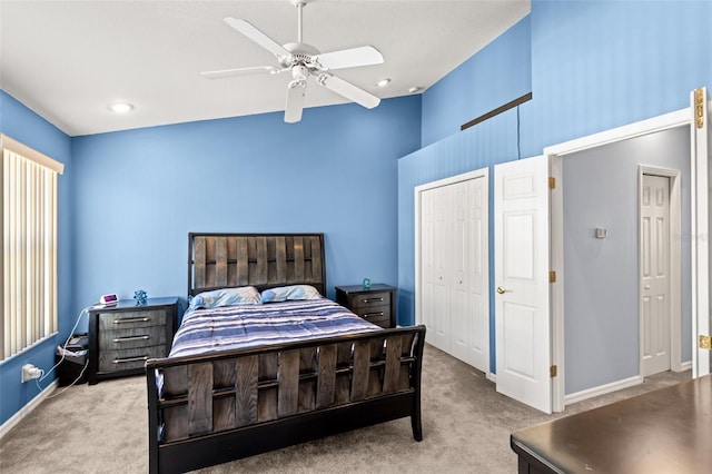 carpeted bedroom with ceiling fan