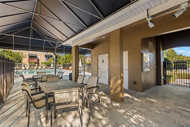 view of patio / terrace featuring a fenced in pool