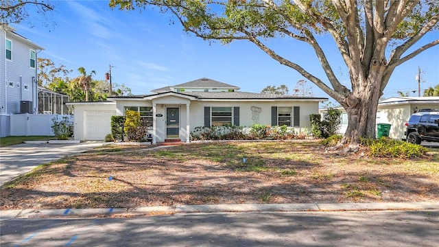 single story home with a garage