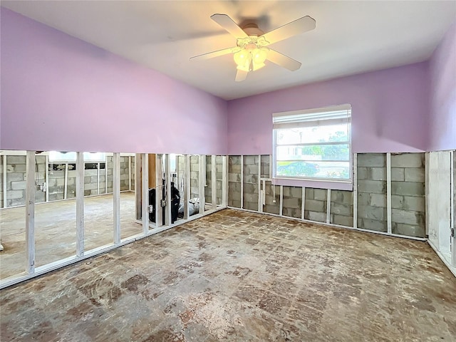 additional living space featuring ceiling fan