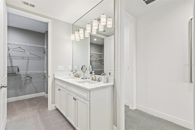 bathroom featuring vanity and tile patterned floors