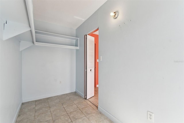 interior space featuring light tile patterned floors