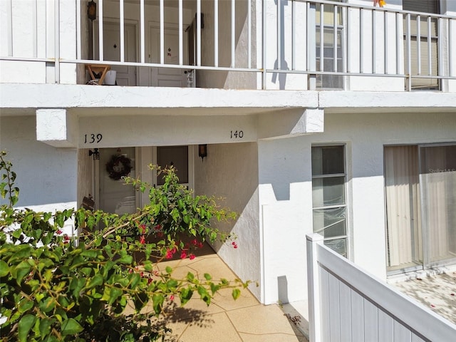 doorway to property with a balcony