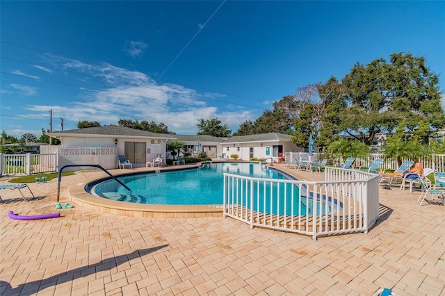 view of pool featuring a patio