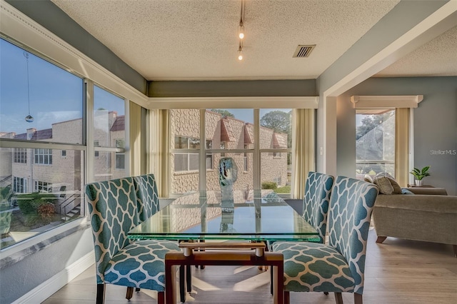 sunroom / solarium with a healthy amount of sunlight