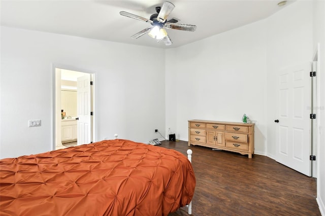 bedroom featuring ensuite bath, ceiling fan, and dark hardwood / wood-style flooring