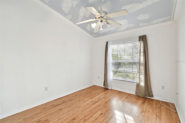 unfurnished room featuring ceiling fan, light hardwood / wood-style flooring, and crown molding