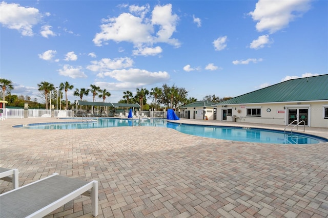 view of pool featuring a patio