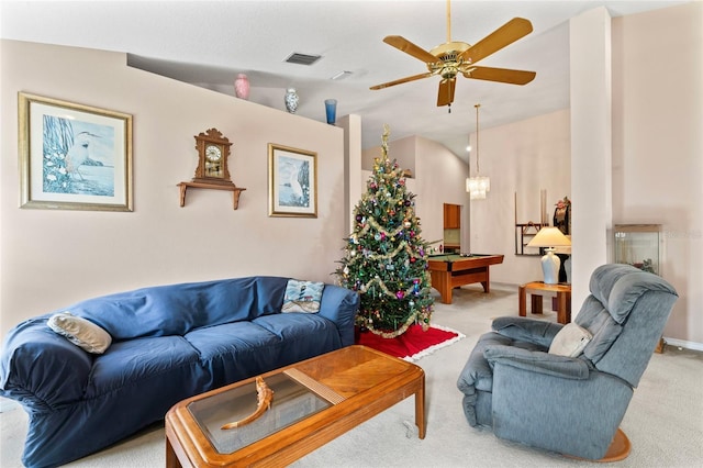 carpeted living room with ceiling fan with notable chandelier, lofted ceiling, and billiards