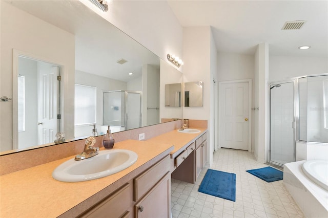 bathroom featuring vanity, lofted ceiling, and independent shower and bath