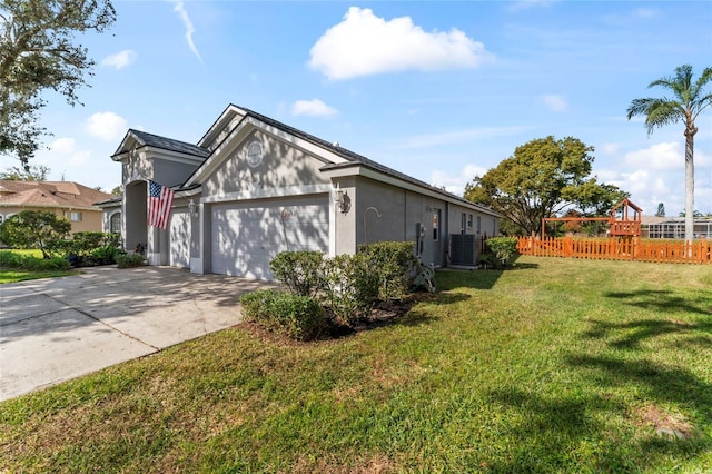 view of property exterior featuring a garage, cooling unit, and a lawn