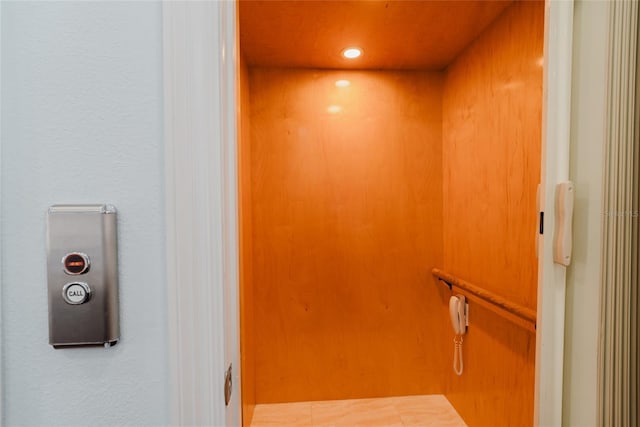 room details featuring recessed lighting and elevator