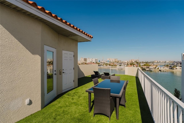 exterior space with a water view