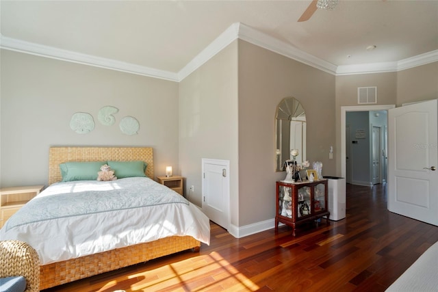 bedroom featuring crown molding, dark hardwood / wood-style floors, and ceiling fan