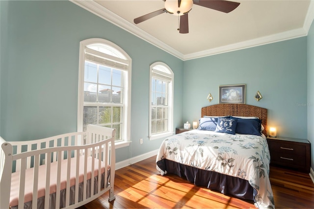 bedroom with wood-type flooring, ornamental molding, and ceiling fan