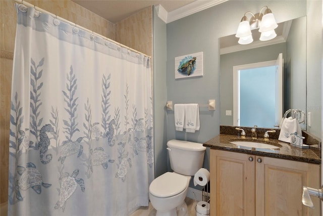 bathroom with ornamental molding, vanity, toilet, and a shower with curtain