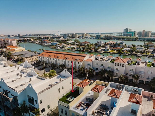 aerial view featuring a water view and a city view