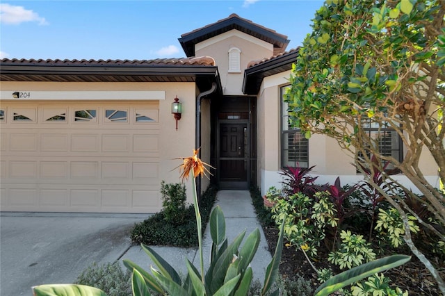 property entrance featuring a garage