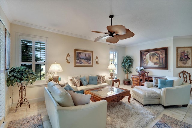 living room with a wealth of natural light, ceiling fan, light tile patterned floors, and ornamental molding