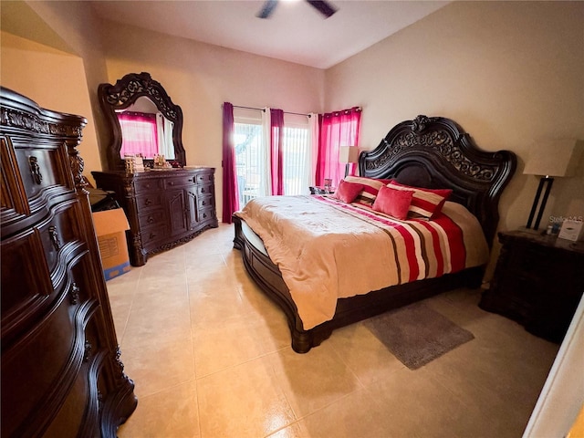 tiled bedroom with ceiling fan