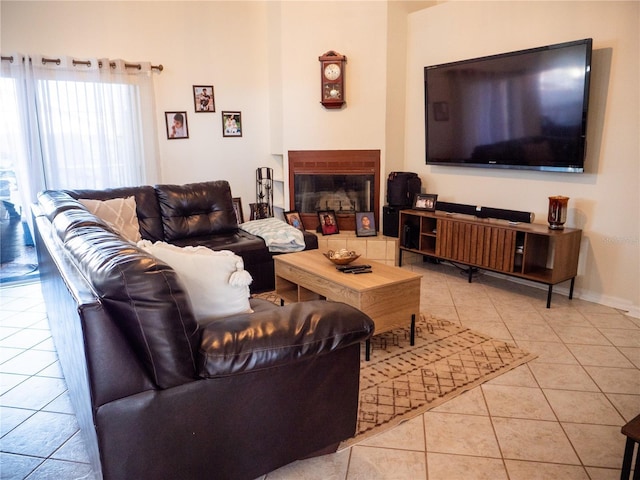 tiled living room featuring a tile fireplace