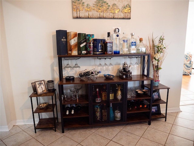 bar featuring tile patterned floors