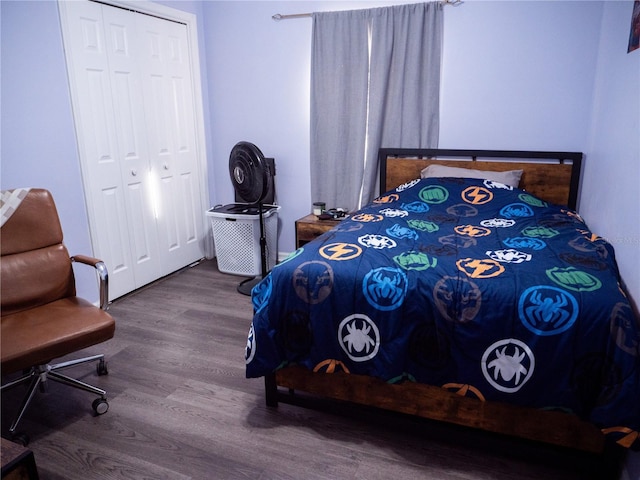 bedroom featuring a closet and wood-type flooring