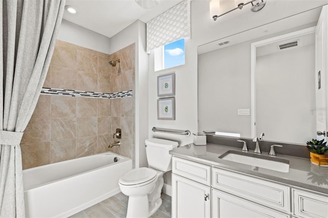 full bathroom featuring vanity, toilet, and shower / bath combo with shower curtain