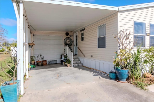 view of patio featuring a carport