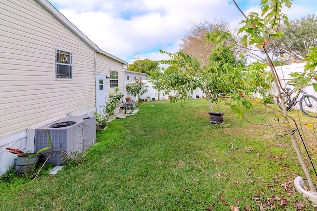 view of yard with central AC