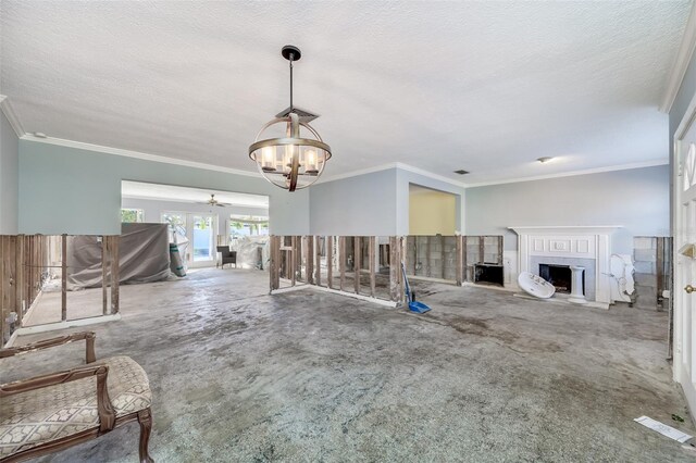 unfurnished living room with carpet flooring, a textured ceiling, and crown molding