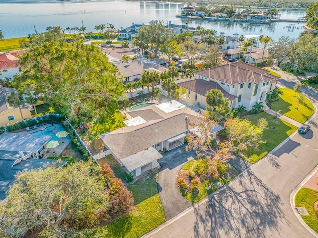 drone / aerial view with a water view