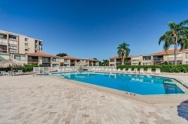 view of swimming pool featuring a patio area