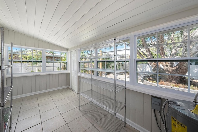 sunroom featuring plenty of natural light, wood ceiling, and vaulted ceiling